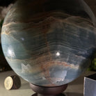 Blue Onyx Quartz Sphere on a Wood Stand, 9.9 lbs & 6.9" Tall #5635 - 0005 - Brazil GemsBrazil GemsBlue Onyx Quartz Sphere on a Wood Stand, 9.9 lbs & 6.9" Tall #5635 - 0005Spheres5635 - 0005