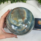 Blue Onyx Quartz Sphere on a Wood Stand, 9.9 lbs & 6.9" Tall #5635 - 0005 - Brazil GemsBrazil GemsBlue Onyx Quartz Sphere on a Wood Stand, 9.9 lbs & 6.9" Tall #5635 - 0005Spheres5635 - 0005