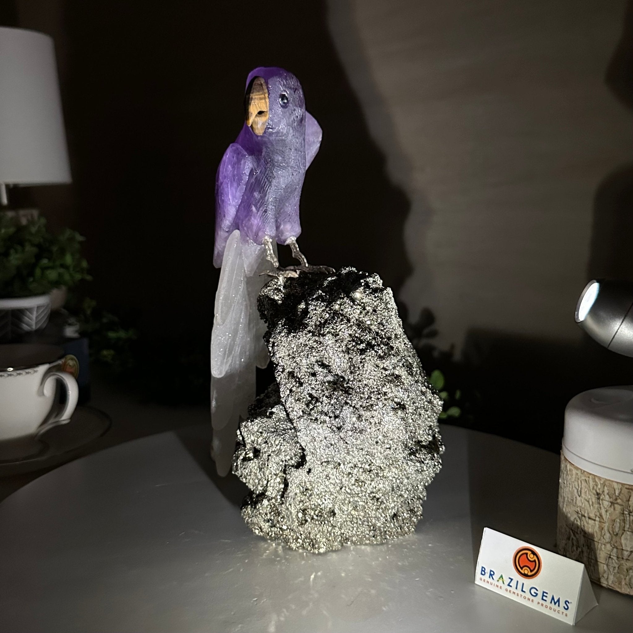 Large Hand - Carved Amethyst Parrot 9.1" Long on a Pyrite Cluster #3005 - AMPPY - 051 - Brazil GemsBrazil GemsLarge Hand - Carved Amethyst Parrot 9.1" Long on a Pyrite Cluster #3005 - AMPPY - 051Crystal Birds3005 - AMPPY - 051