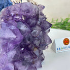 Large Hand - Carved Clear Quartz Cockatoo 10.3" Long on an Amethyst Cluster #3005 - CQCAM - 043 - Brazil GemsBrazil GemsLarge Hand - Carved Clear Quartz Cockatoo 10.3" Long on an Amethyst Cluster #3005 - CQCAM - 043Crystal Birds3005 - CQCAM - 043
