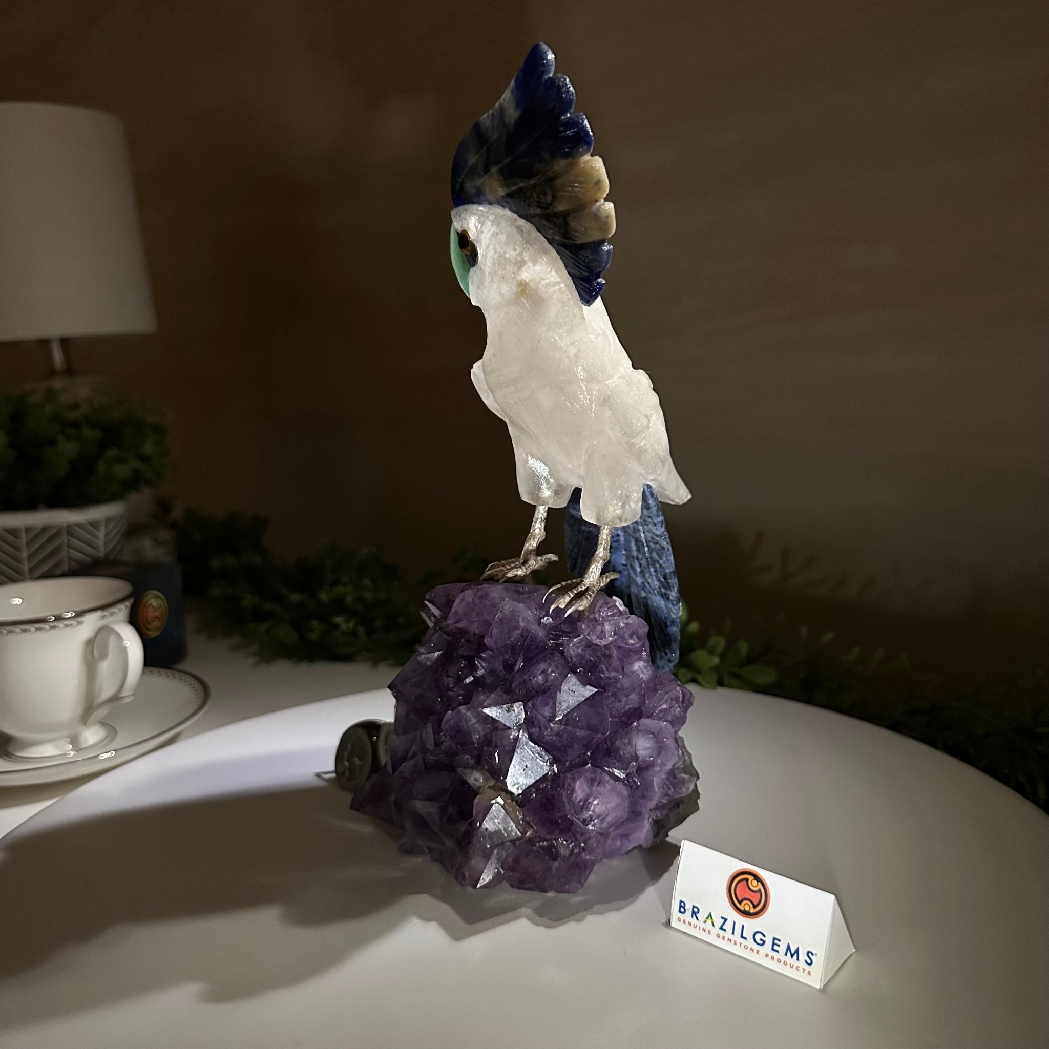 Large Hand - Carved Clear Quartz Cockatoo 10.3" Long on an Amethyst Cluster #3005 - CQCAM - 043 - Brazil GemsBrazil GemsLarge Hand - Carved Clear Quartz Cockatoo 10.3" Long on an Amethyst Cluster #3005 - CQCAM - 043Crystal Birds3005 - CQCAM - 043