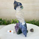 Large Hand - Carved Clear Quartz Cockatoo 10.3" Long on an Amethyst Cluster #3005 - CQCAM - 043 - Brazil GemsBrazil GemsLarge Hand - Carved Clear Quartz Cockatoo 10.3" Long on an Amethyst Cluster #3005 - CQCAM - 043Crystal Birds3005 - CQCAM - 043
