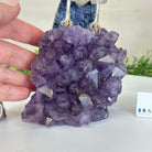 Large Hand - Carved Clear Quartz Cockatoo 10.3" Long on an Amethyst Cluster #3005 - CQCAM - 043 - Brazil GemsBrazil GemsLarge Hand - Carved Clear Quartz Cockatoo 10.3" Long on an Amethyst Cluster #3005 - CQCAM - 043Crystal Birds3005 - CQCAM - 043