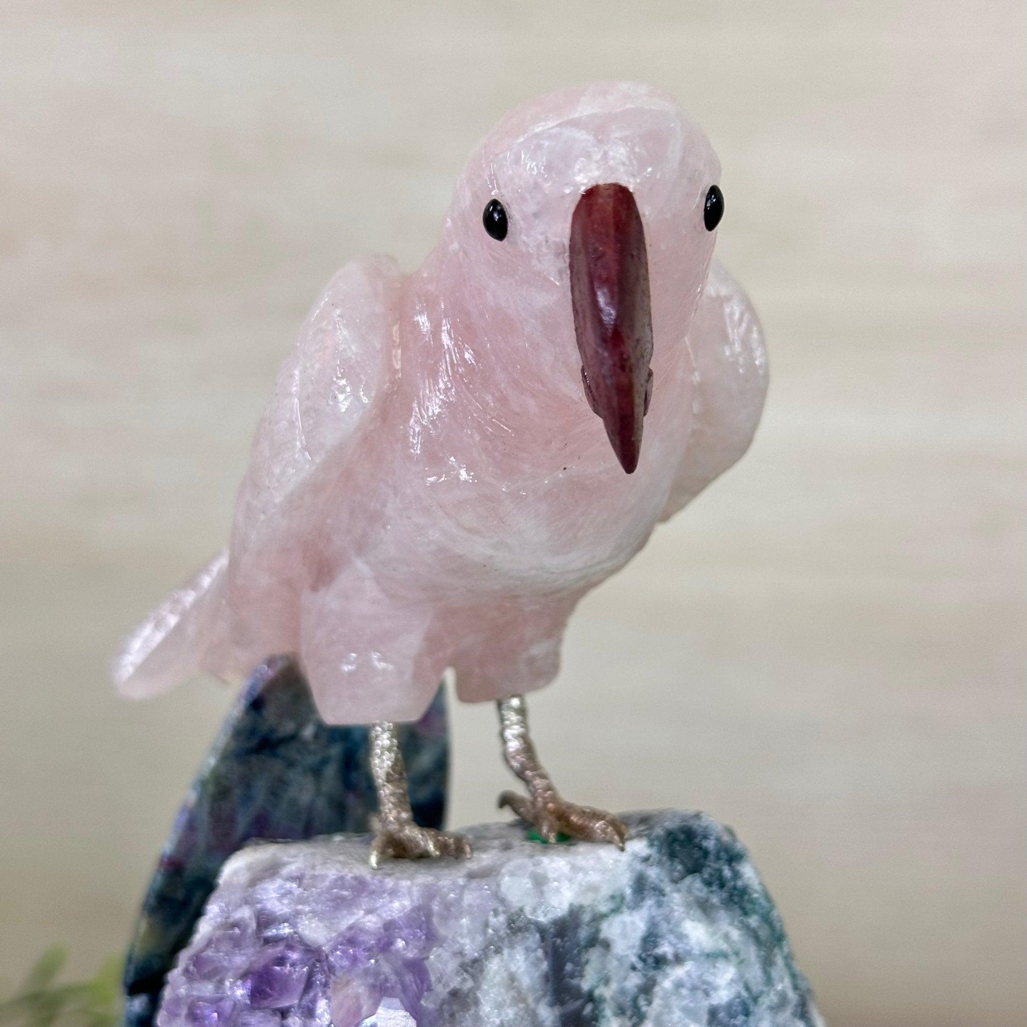 Hand - Carved Rose Quartz Parrot on an Amethyst Base, 8.3" Tall #3004 - RQPAM - 022 - Brazil GemsBrazil GemsHand - Carved Rose Quartz Parrot on an Amethyst Base, 8.3" Tall #3004 - RQPAM - 022Crystal Birds3004 - RQPAM - 022