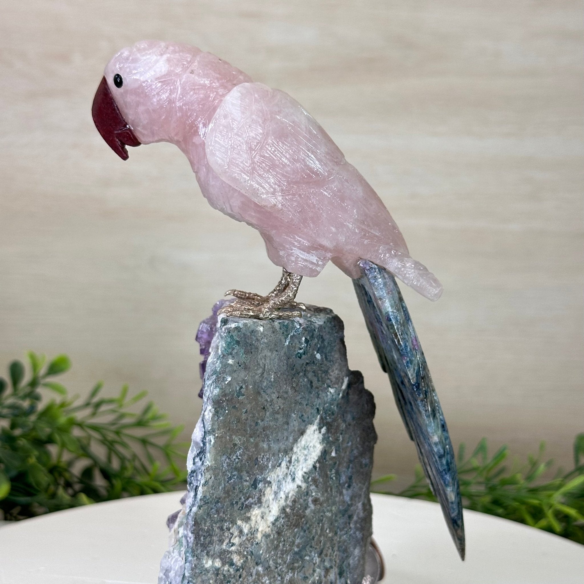 Hand - Carved Rose Quartz Parrot on an Amethyst Base, 8.3" Tall #3004 - RQPAM - 022 - Brazil GemsBrazil GemsHand - Carved Rose Quartz Parrot on an Amethyst Base, 8.3" Tall #3004 - RQPAM - 022Crystal Birds3004 - RQPAM - 022