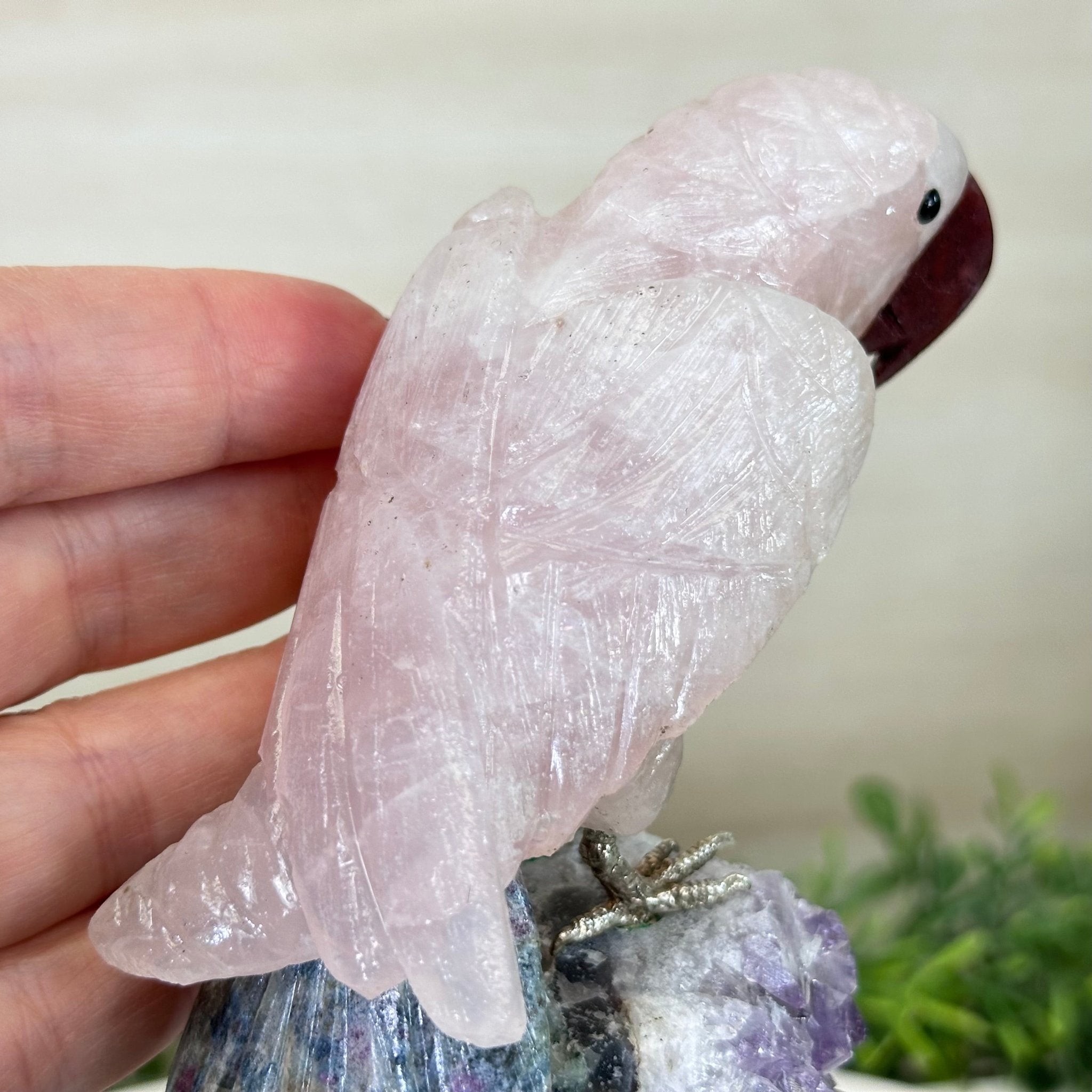 Hand - Carved Rose Quartz Parrot on an Amethyst Base, 8.3" Tall #3004 - RQPAM - 022 - Brazil GemsBrazil GemsHand - Carved Rose Quartz Parrot on an Amethyst Base, 8.3" Tall #3004 - RQPAM - 022Crystal Birds3004 - RQPAM - 022