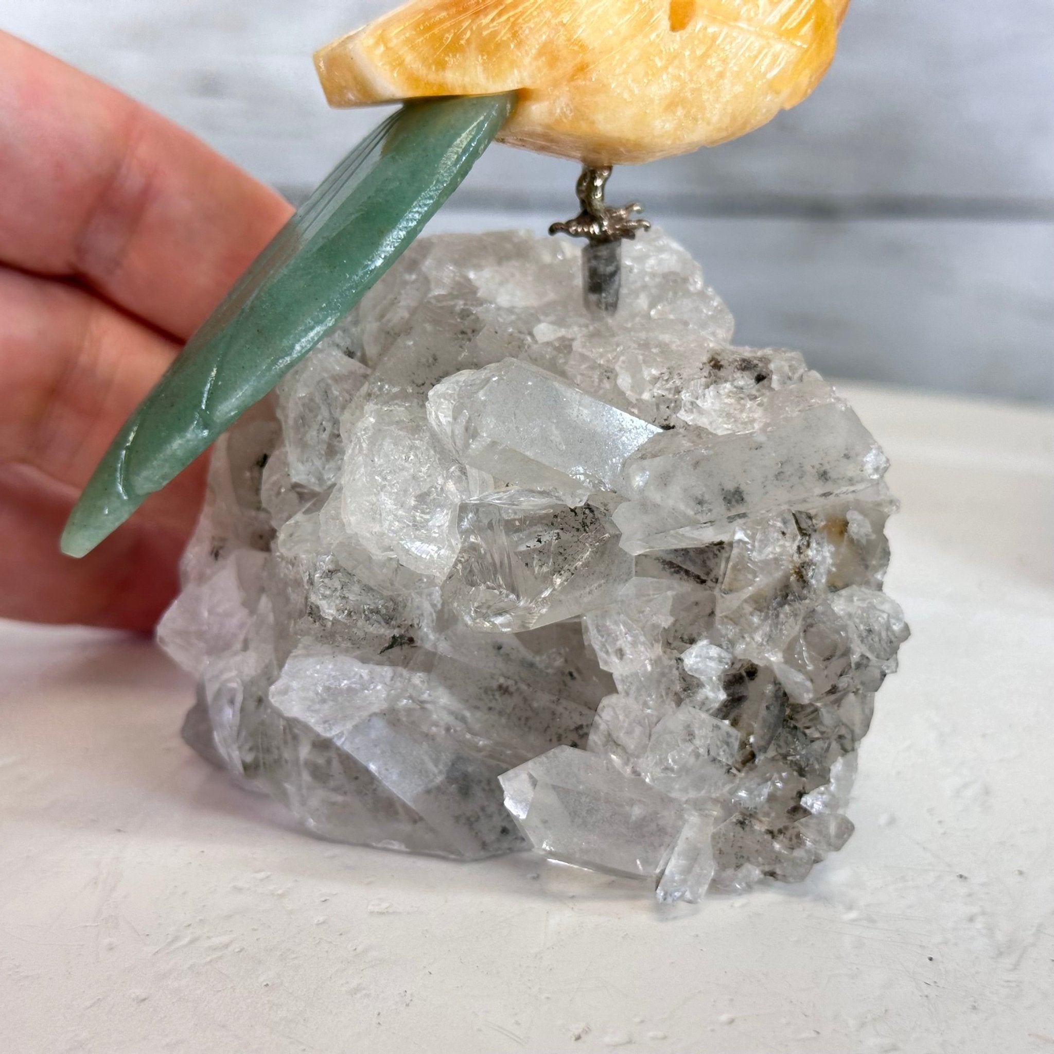 Small Hand - Carved Orange Calcite Cockatoo on a Clear Quartz Base #3002 - ORCCQ - 019 - Brazil GemsBrazil GemsSmall Hand - Carved Orange Calcite Cockatoo on a Clear Quartz Base #3002 - ORCCQ - 019Crystal Birds3002 - ORCCQ - 019