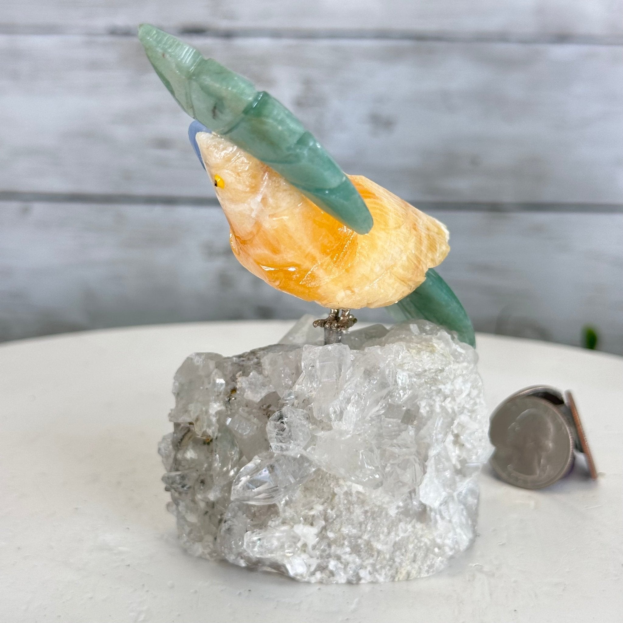 Small Hand - Carved Orange Calcite Cockatoo on a Clear Quartz Base #3002 - ORCCQ - 019 - Brazil GemsBrazil GemsSmall Hand - Carved Orange Calcite Cockatoo on a Clear Quartz Base #3002 - ORCCQ - 019Crystal Birds3002 - ORCCQ - 019