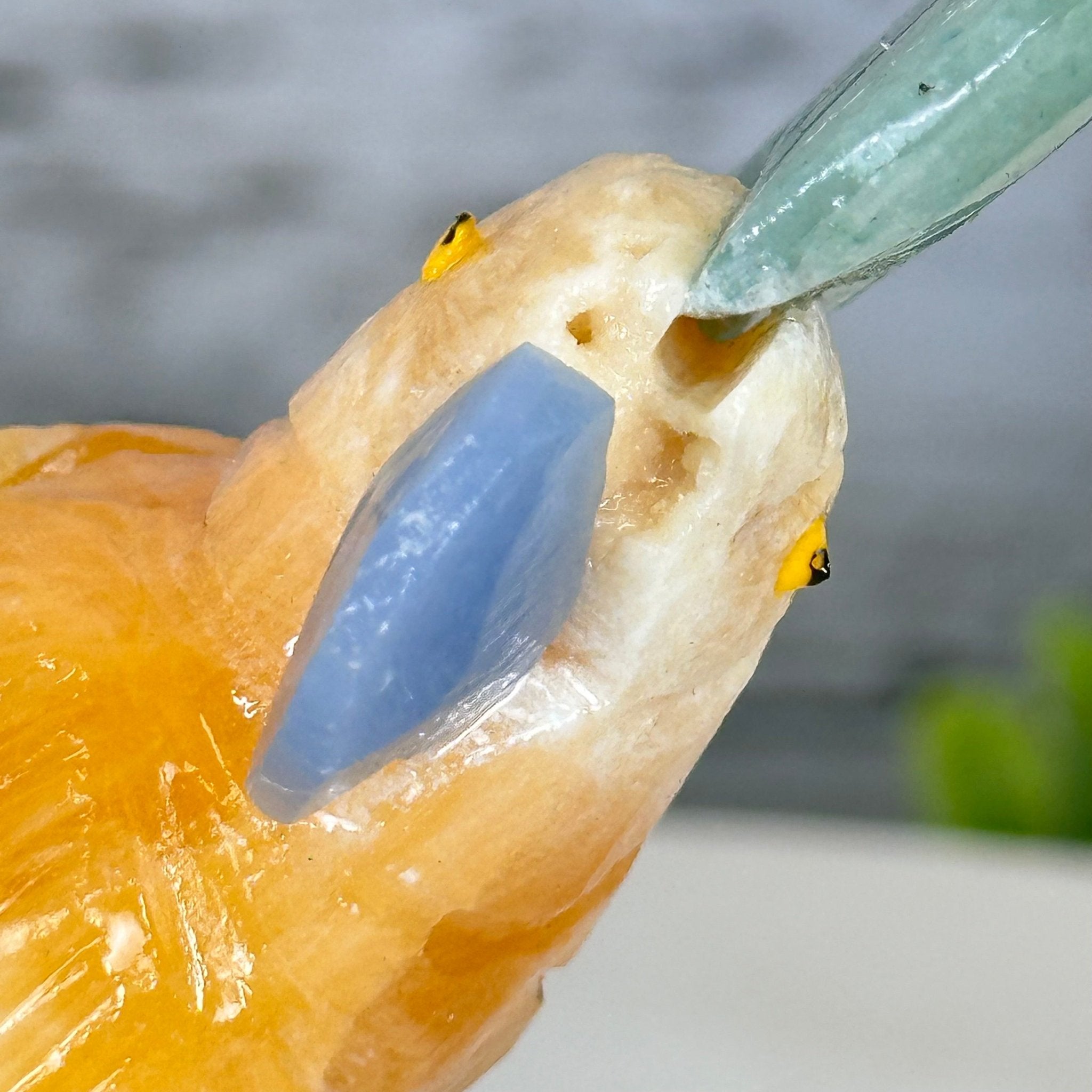 Small Hand - Carved Orange Calcite Cockatoo on a Clear Quartz Base #3002 - ORCCQ - 019 - Brazil GemsBrazil GemsSmall Hand - Carved Orange Calcite Cockatoo on a Clear Quartz Base #3002 - ORCCQ - 019Crystal Birds3002 - ORCCQ - 019