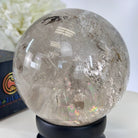 Super Quality Smoky Quartz Sphere on Wood Base 3.3 lbs & 4.9" Tall #5636 - 0010 - Brazil GemsBrazil GemsSuper Quality Smoky Quartz Sphere on Wood Base 3.3 lbs & 4.9" Tall #5636 - 0010Spheres5636 - 0010