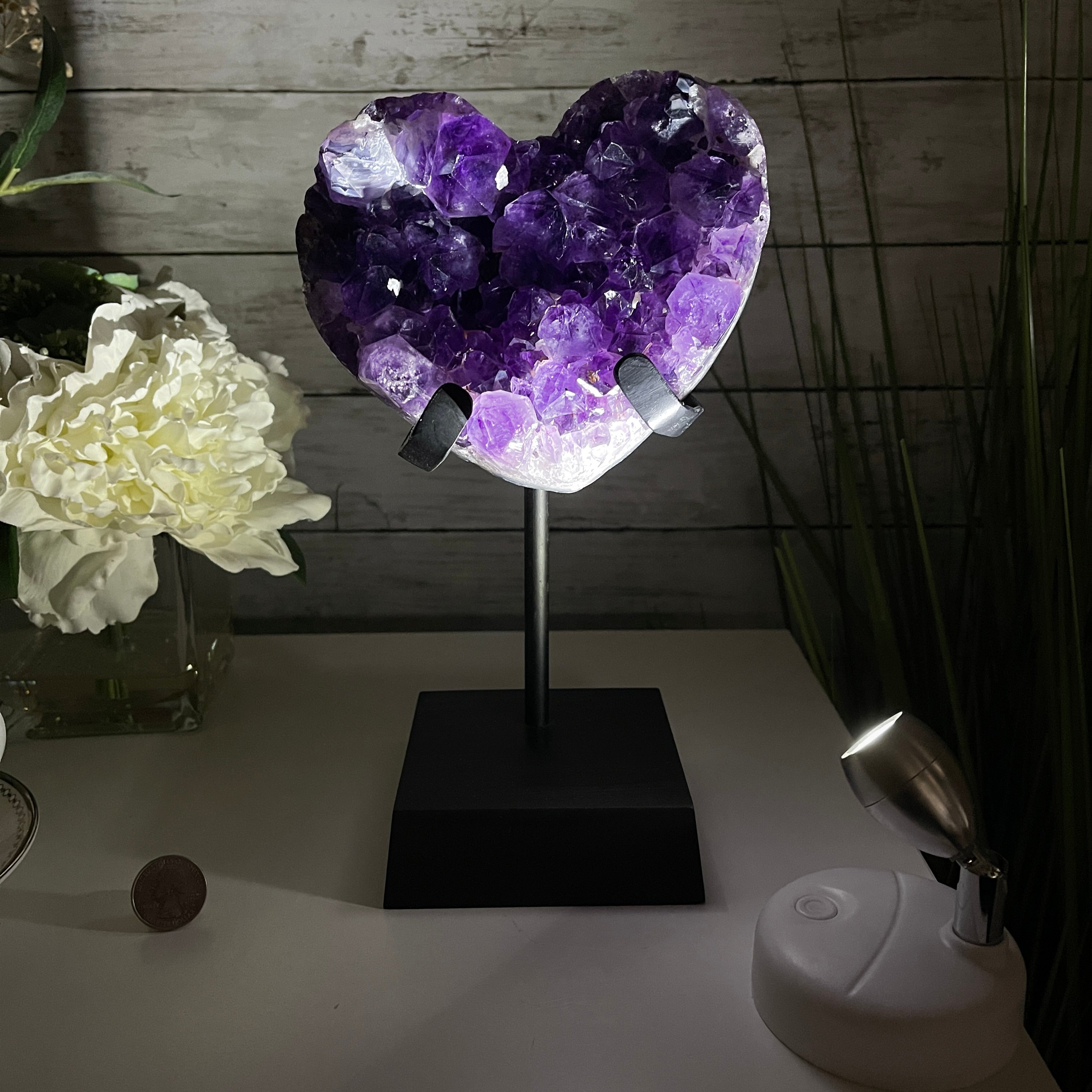 Amethyst heart geode displayed on a table